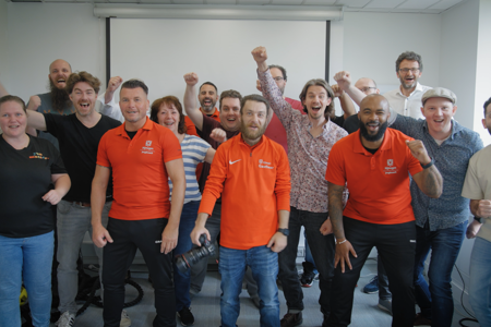 Een enthousiaste foto van het Ranshuijsen team en de Jeugdcoaches uit Nijmegen